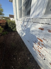 repainting brick after weather damage