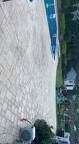 spreading polymeric sand on pavers